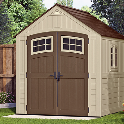 A finished DIY shed resting on a concrete slab. A finished DIY shed resting on a concrete slab.
