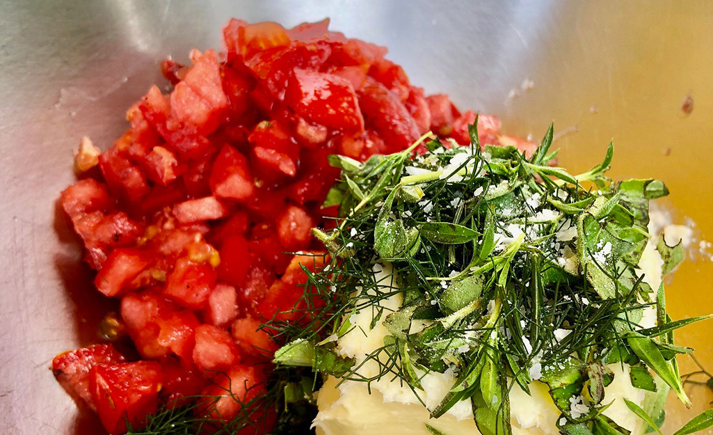 Chopped tomatoes and herbs with butter