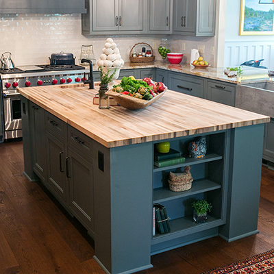 black cabinets with butcher block        
        <figure class=