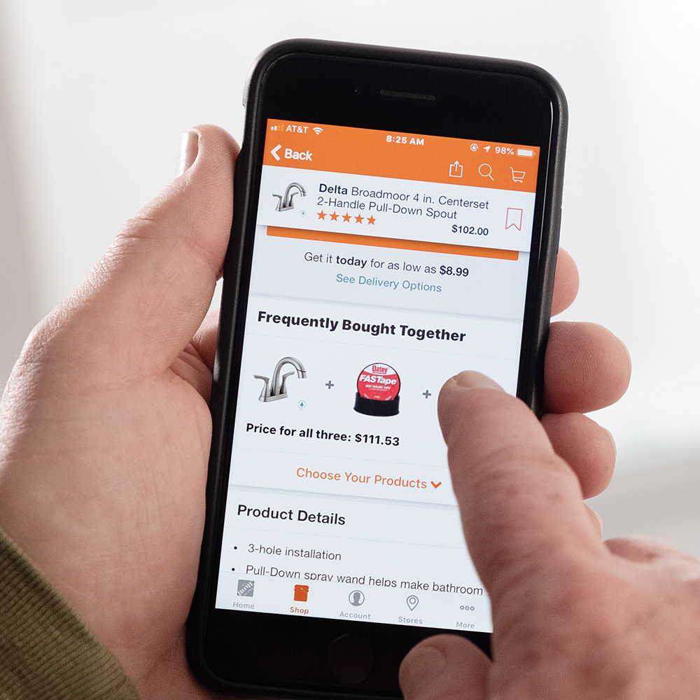 A person uses The Home Depot app to buy a product.