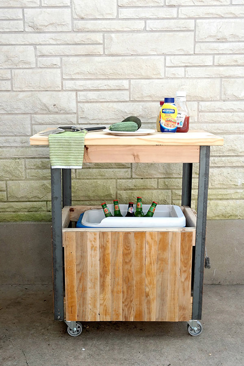 A grill cart made from old wood floors.