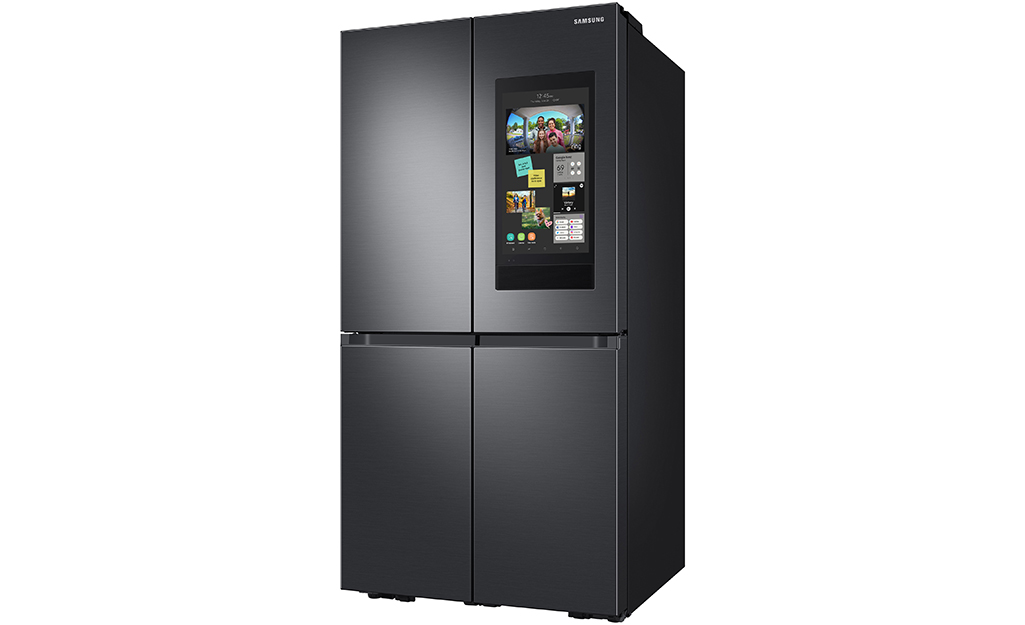 A black four-door refrigerator.