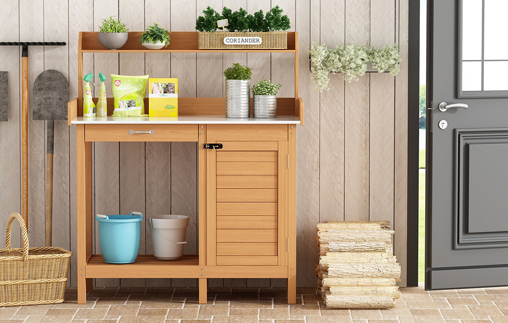 A potting bench holds gardening tools and supplies.