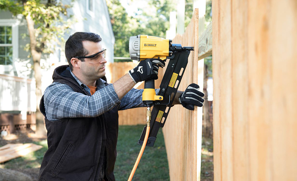 installing a wooden fence