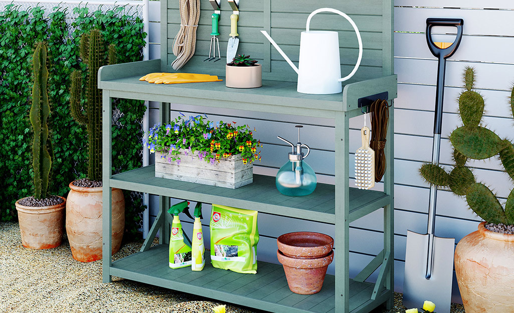 A potting bench on a patio.