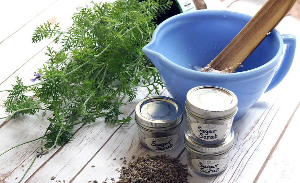 Homemade lavender scrub on a wood table.