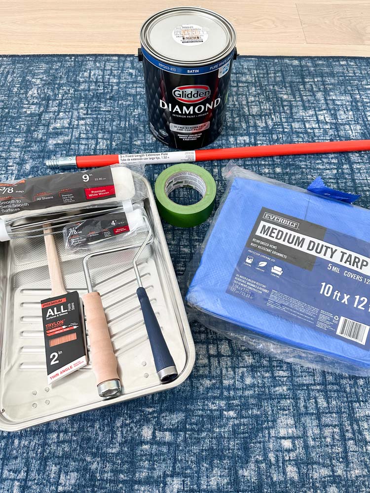 Tools and Glidden paint used to paint the accent wall.