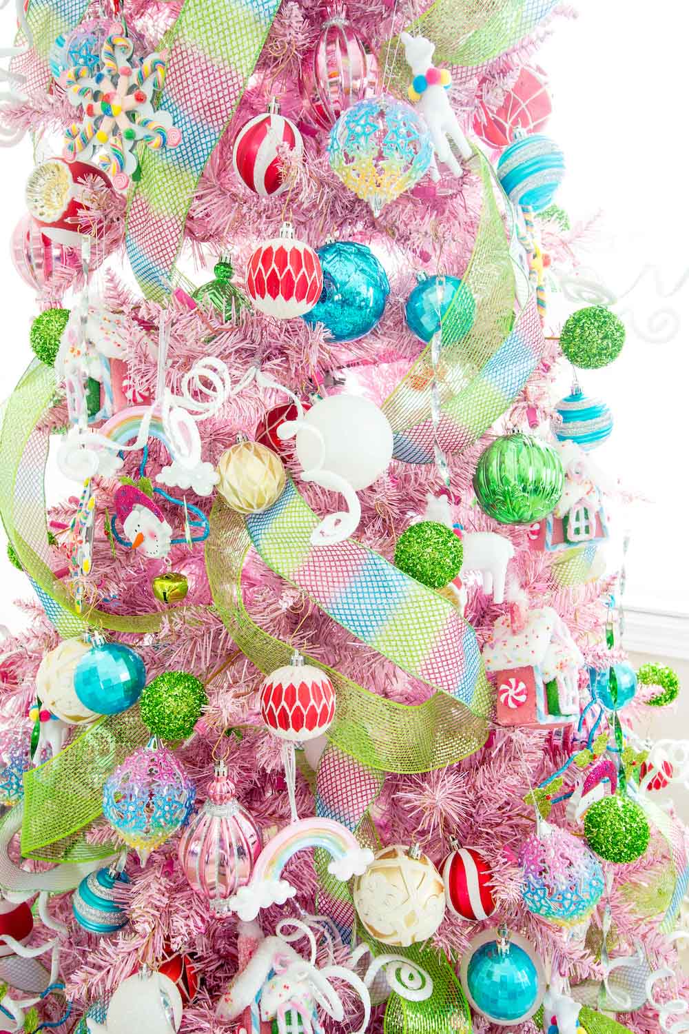 Close up shot of pink Christmas and colorful ornaments