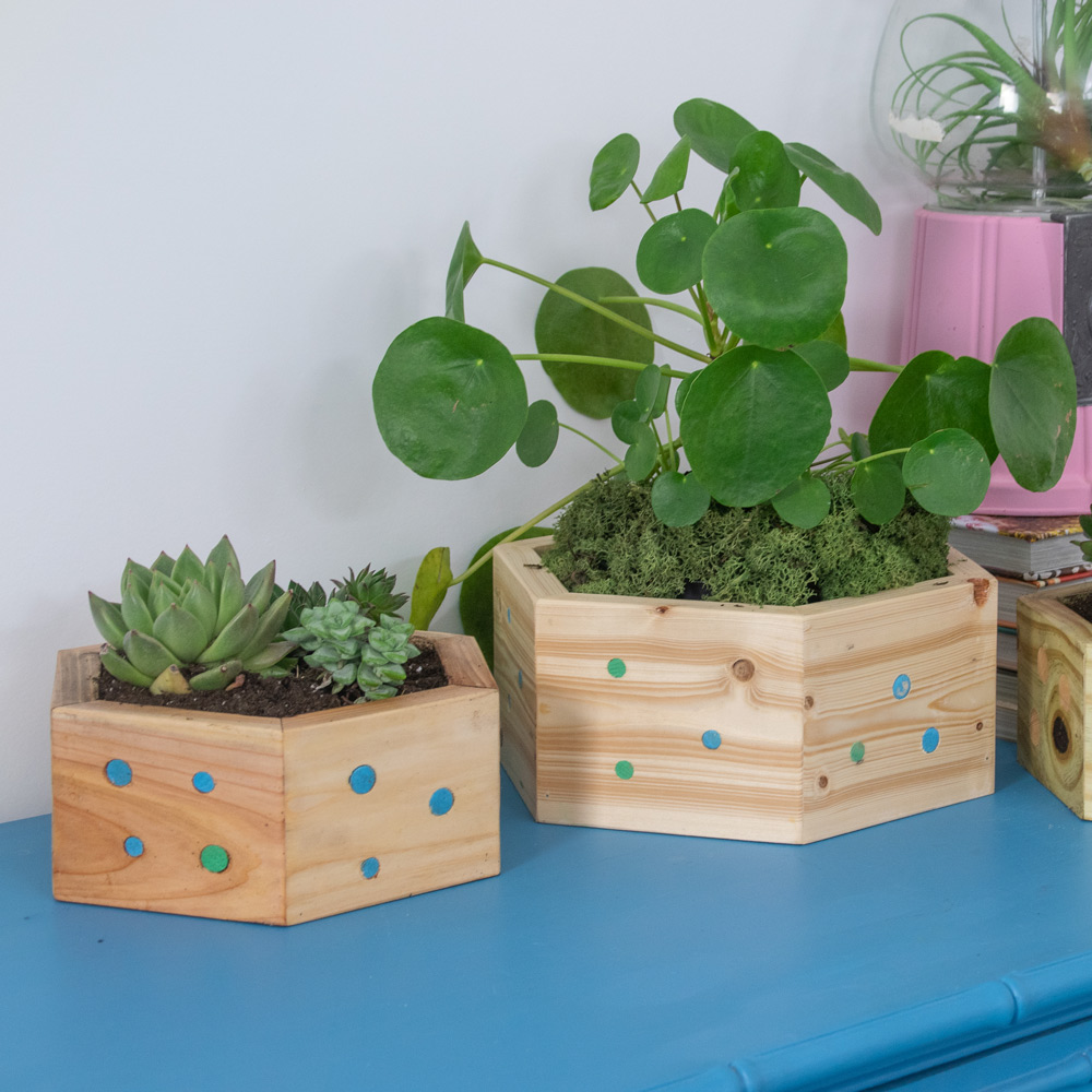 Two finished hexagonal wooden planters