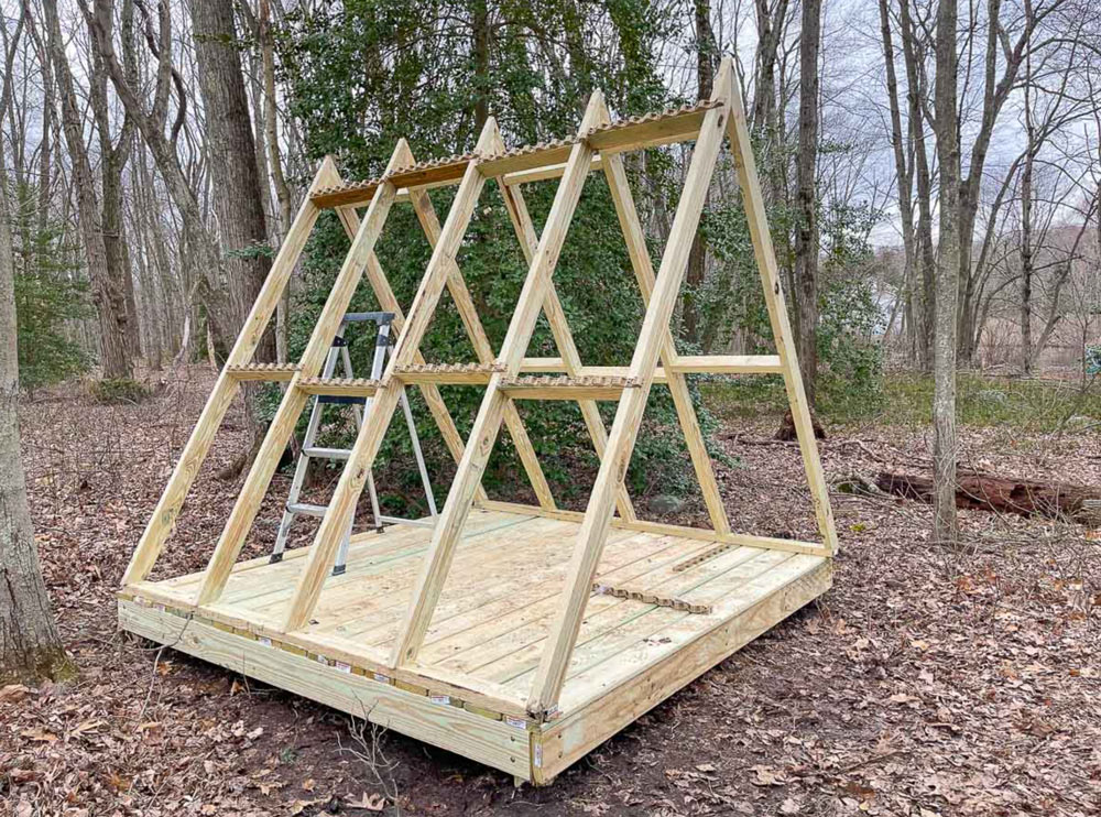 A wooden playhouse frame.