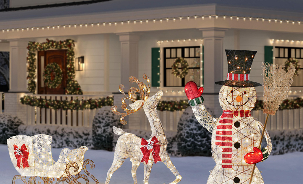 String Christmas lights hung on the eaves of a house.