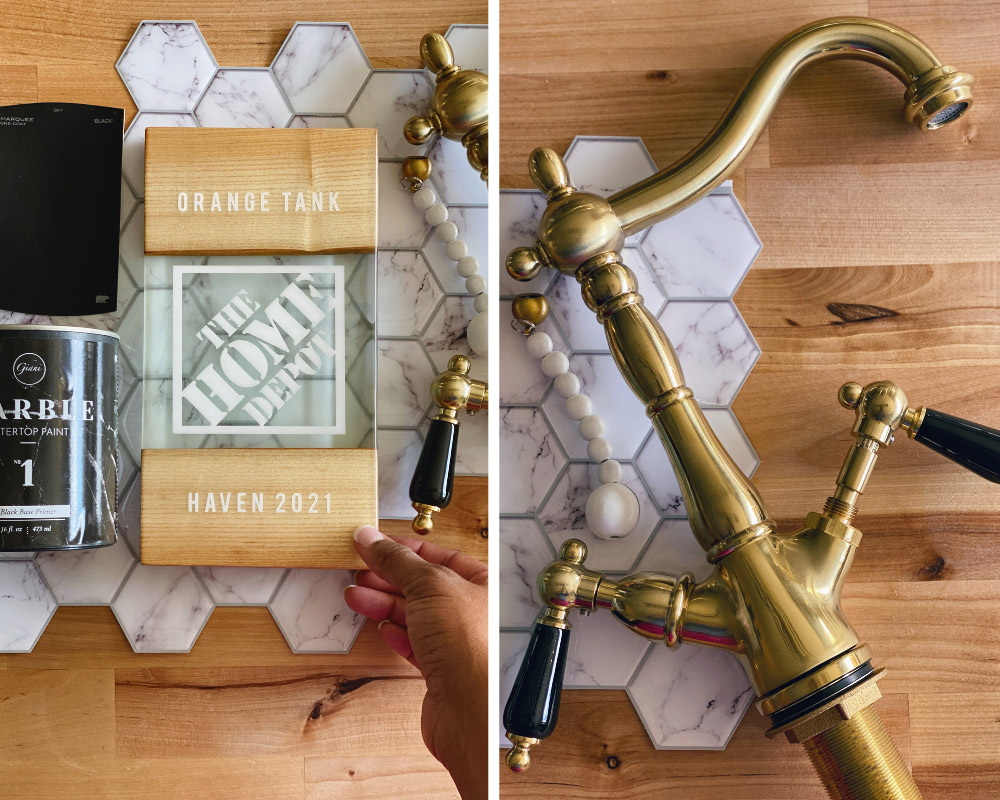 Wood and glass Orange Tank competition award and golden vintage faucet staged on top of white marble tile.