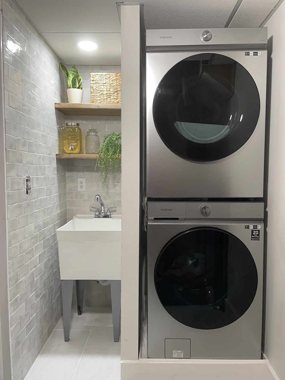 Renovated laundry room with new Samsung washer and dryer. Renovated laundry room with new Samsung washer and dryer.