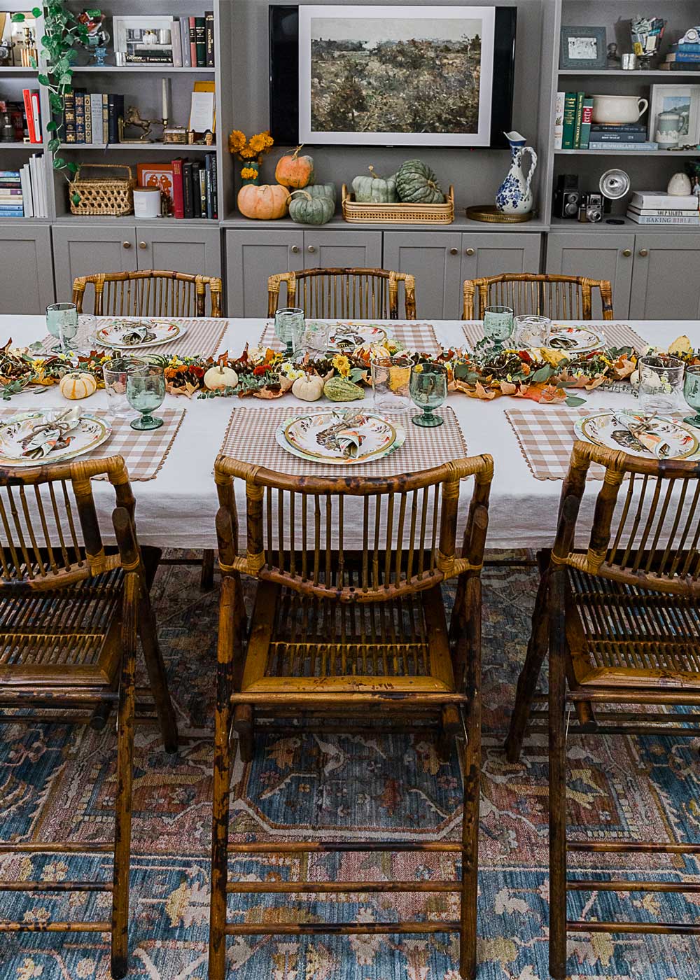 Finished Friendsgiving table with garland. Finished Friendsgiving table with garland.