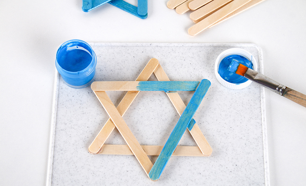 A DIY Star of David made from popsicle sticks.
