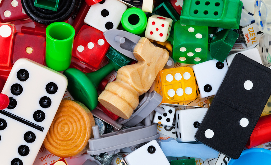 Colorful game pieces laying on a table.