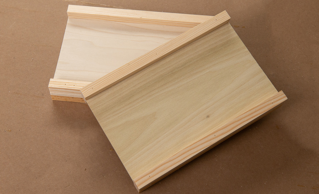 Interior wood walls of dollhouse ready to be assembled. Interior wood walls of dollhouse ready to be assembled.