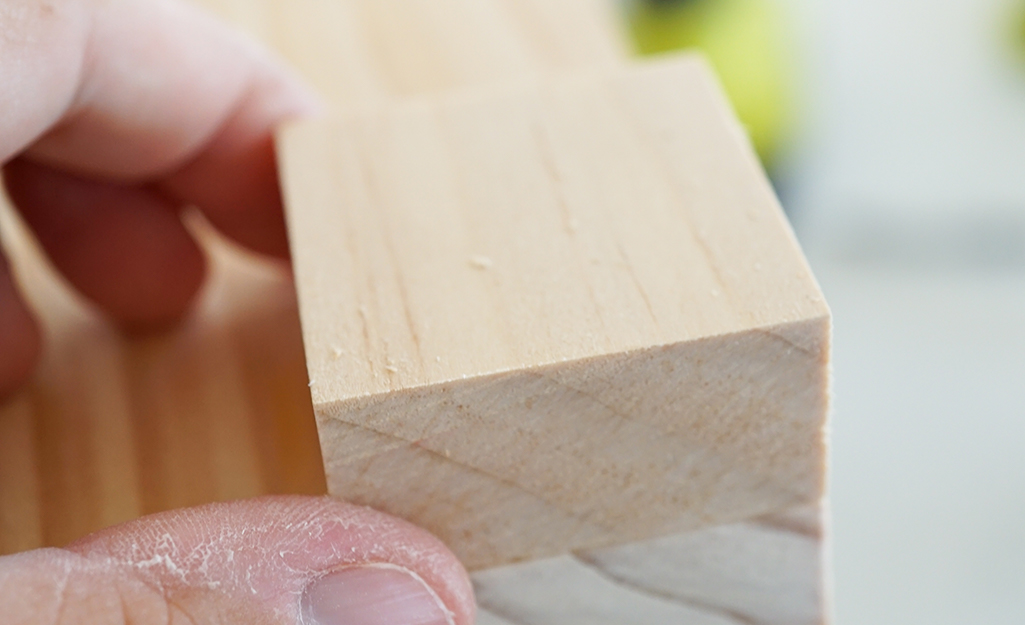 Person attaching the square piece. Person attaching the square piece.