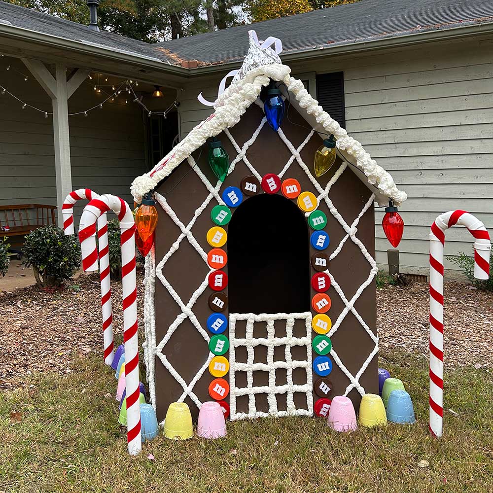 A life size wooden gingerbread house.