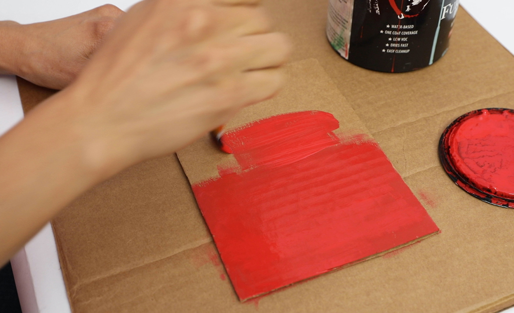 Cardboard is painted red. 