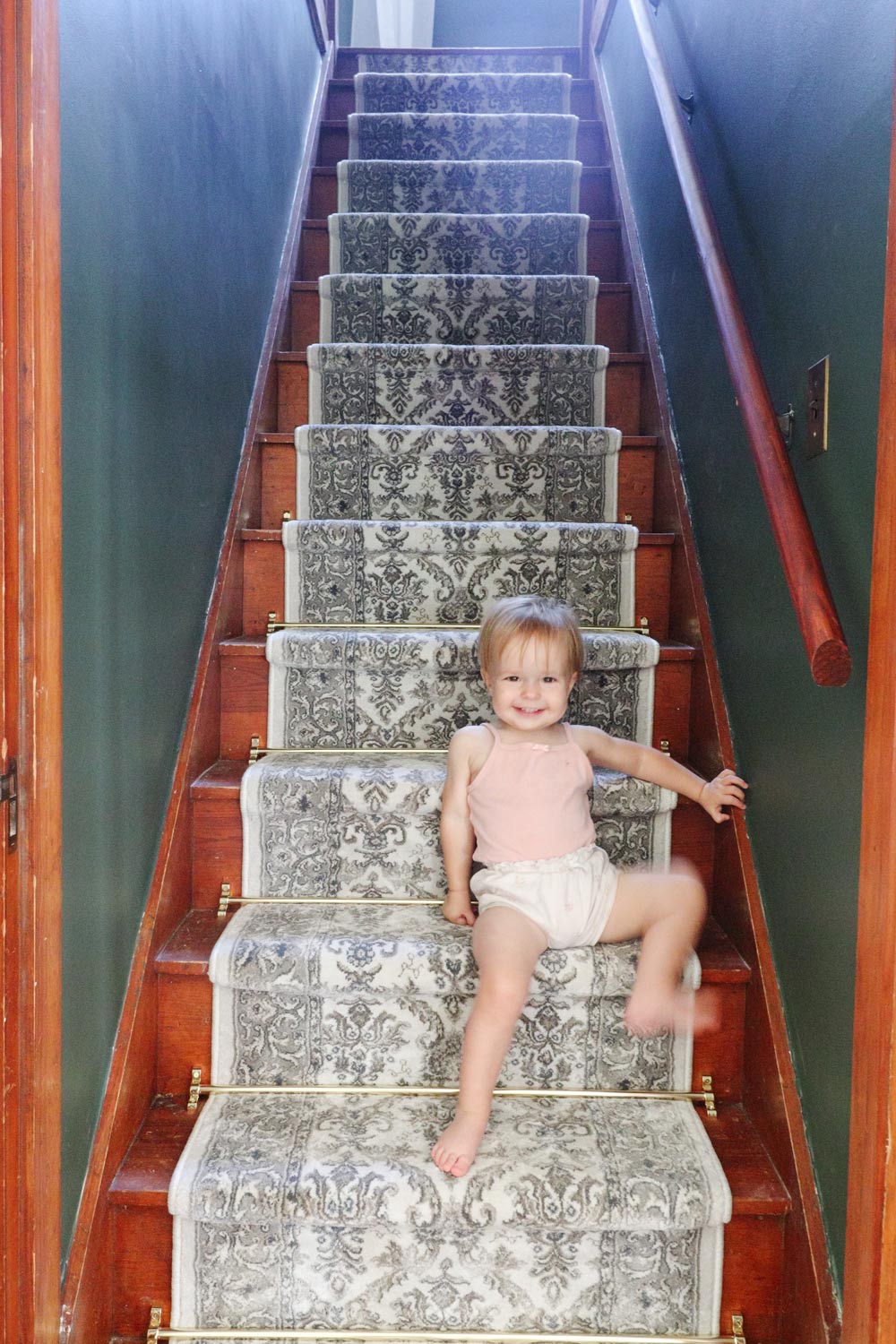 A person sitting on the completed staircase.