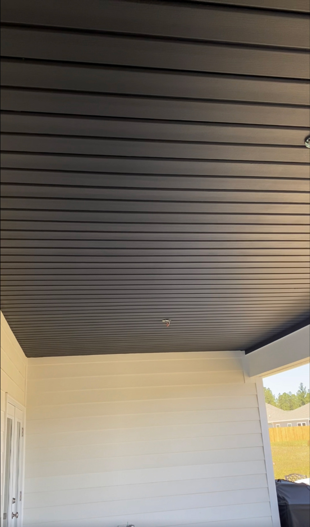 A ceiling completed with a coat of black paint. A ceiling completed with a coat of black paint.
