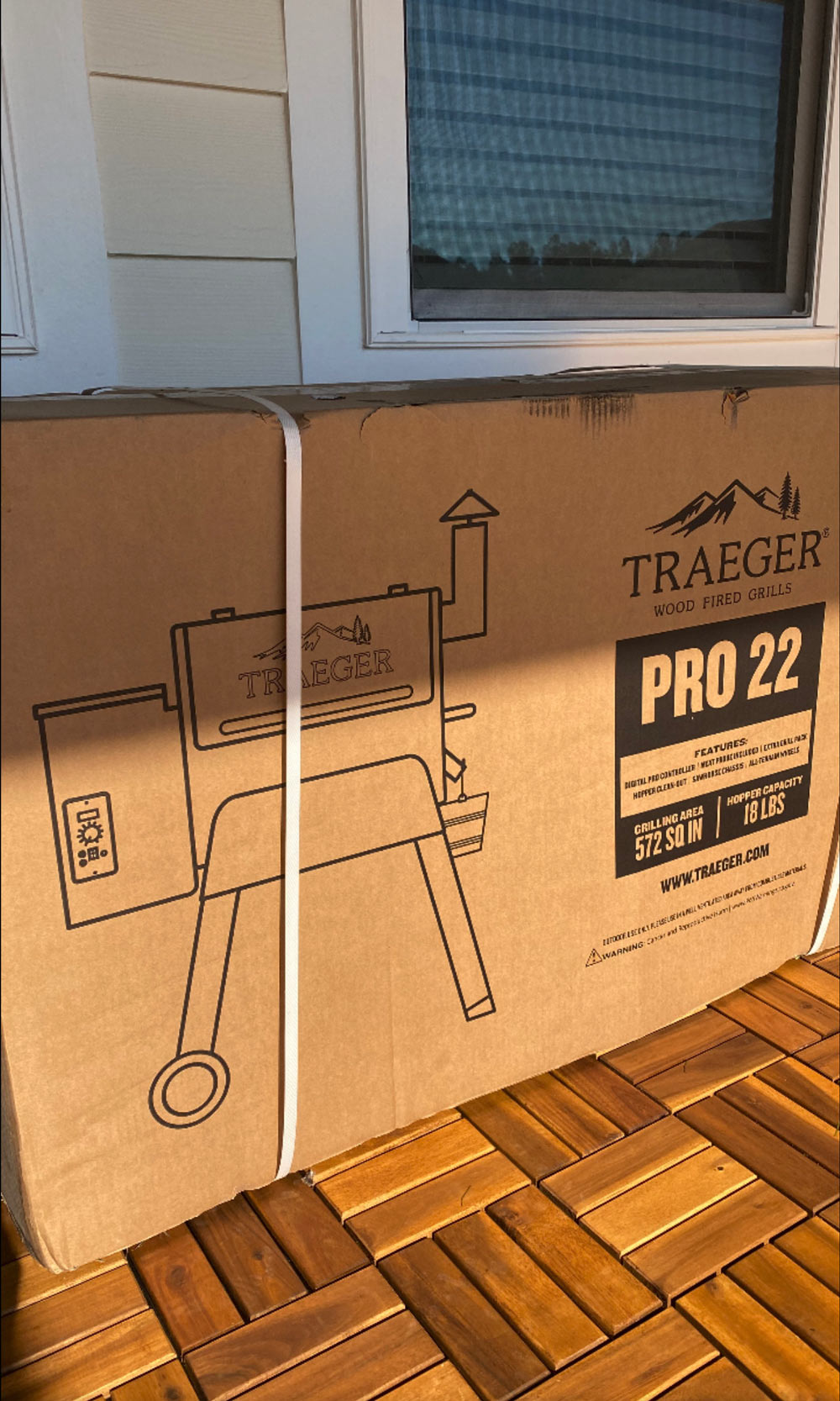 A Trager Pro 22 grill box. A Trager Pro 22 grill box.