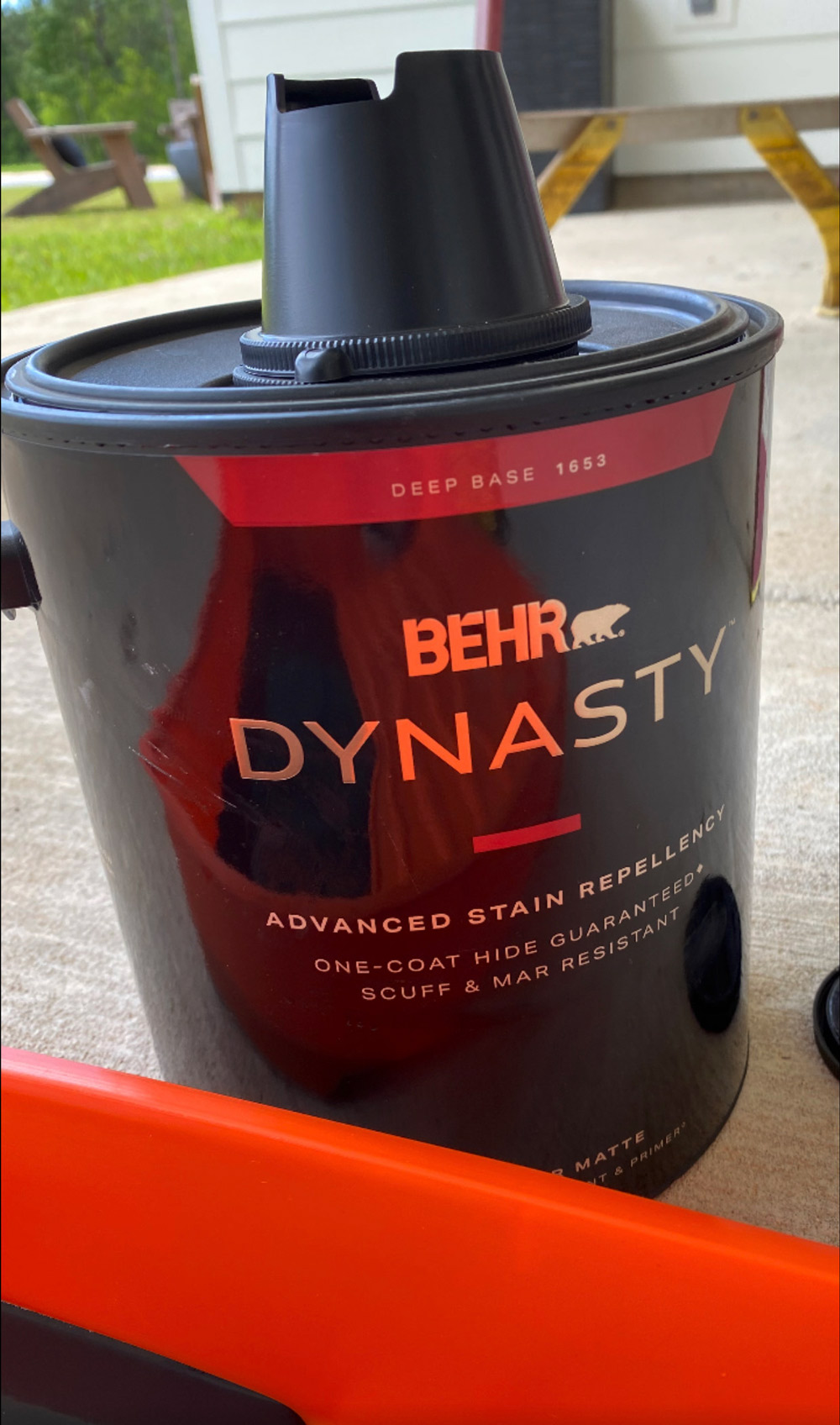 A can of Behr Dynasty paint. A can of Behr Dynasty paint.