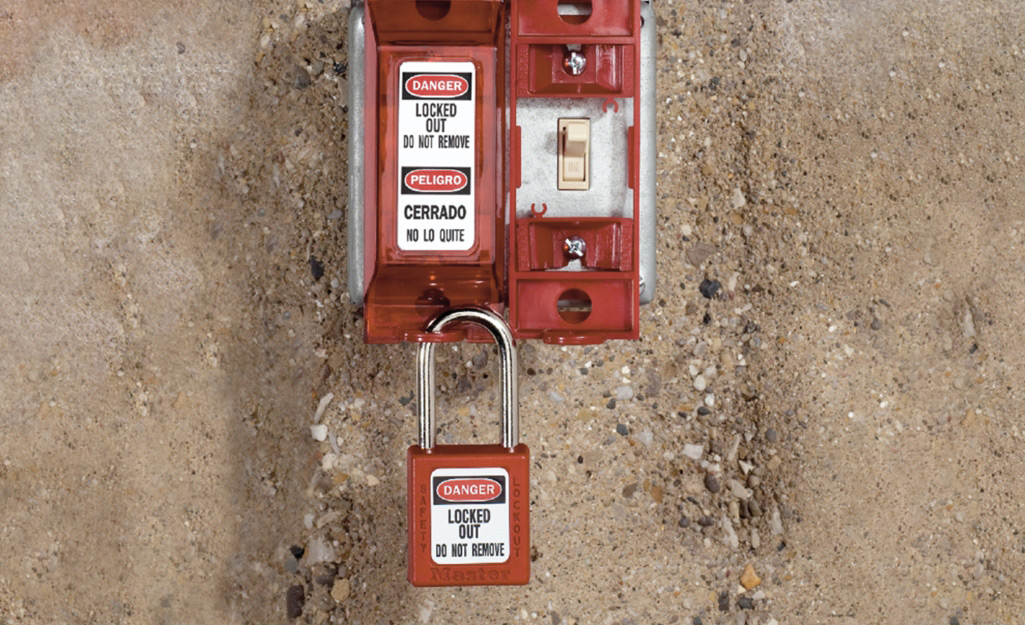 A wall switch safety lockout.