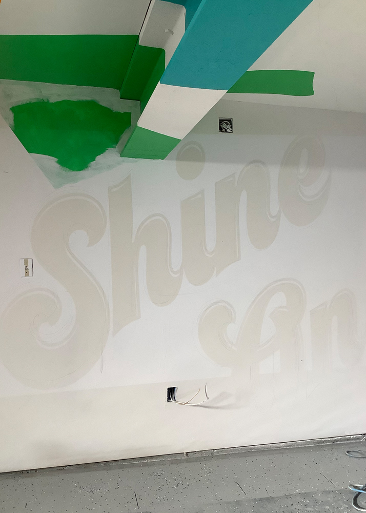 Outline of Phrase Shine On on garage wall. Outline of Phrase Shine On on garage wall.