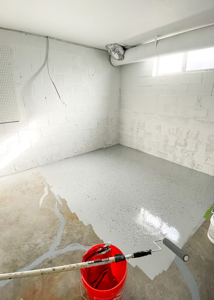 Half of the garage floor with a coating applied. Half of the garage floor with a coating applied.