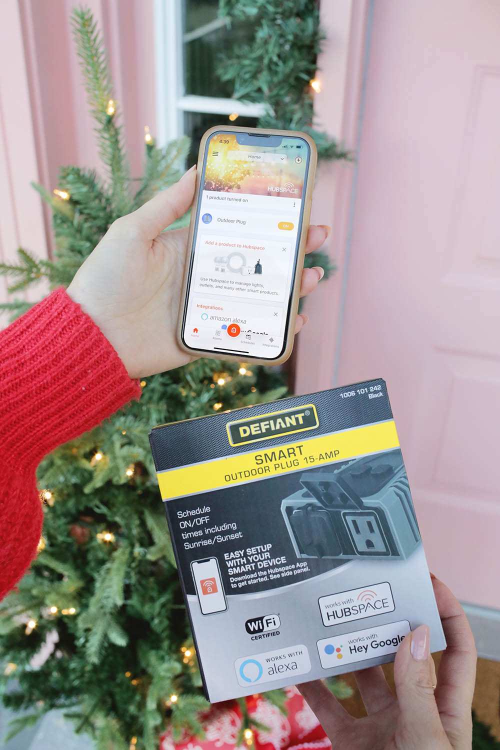 A person connecting their HubSpace plug to the HubSpace mobile app.