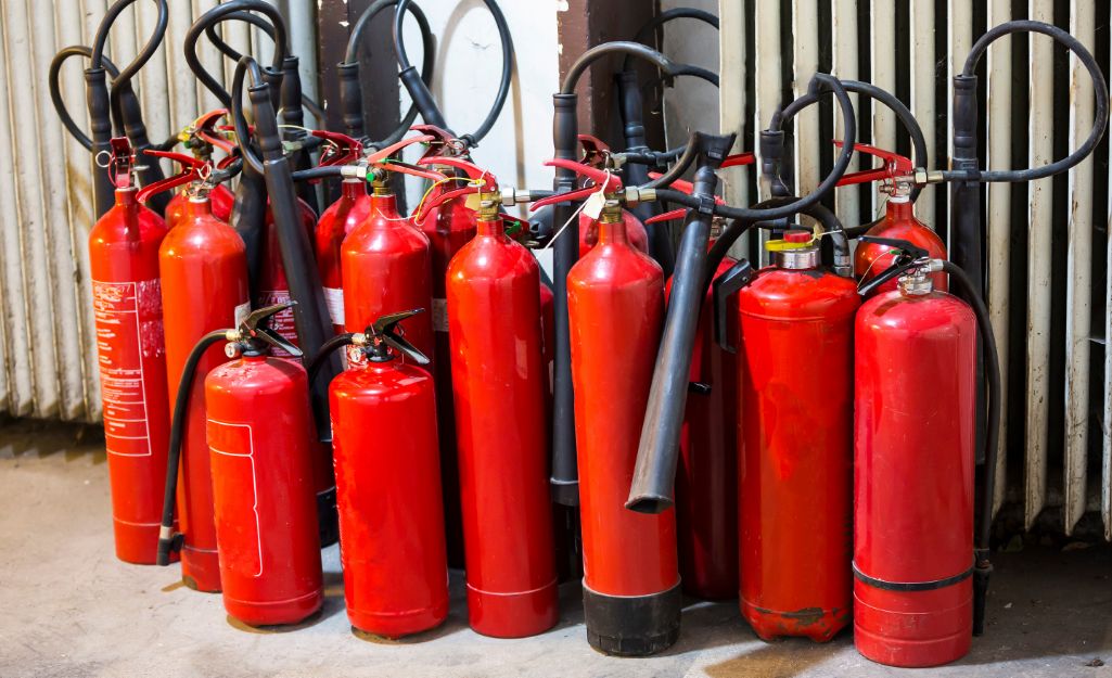 Empty fire extinguishers before processing at an HHW facility.