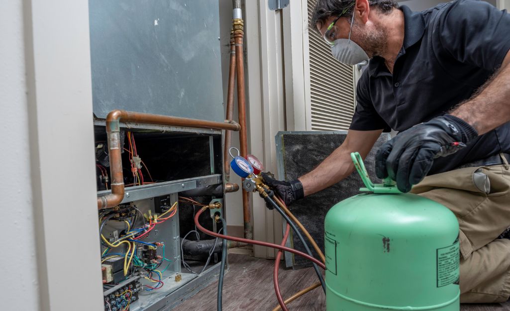 A Pro does a pressure test on an HVAC system.