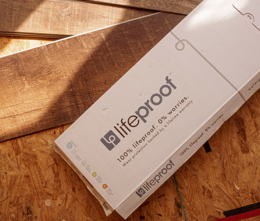 Photo of unopened Lifeproof Flooring packaging. Photo of unopened Lifeproof Flooring packaging.
