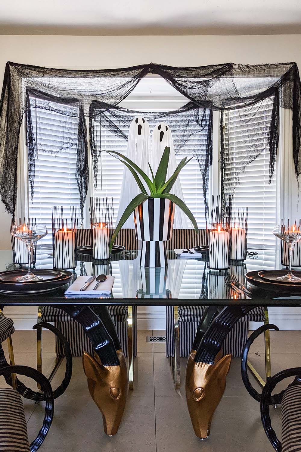 Dining room set up with Halloween decorations.
