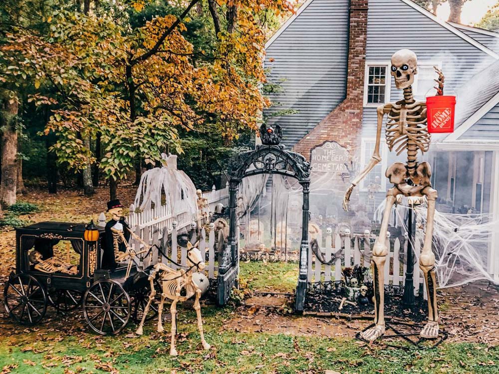 The front entrance of a ghostly graveyard for Halloween.