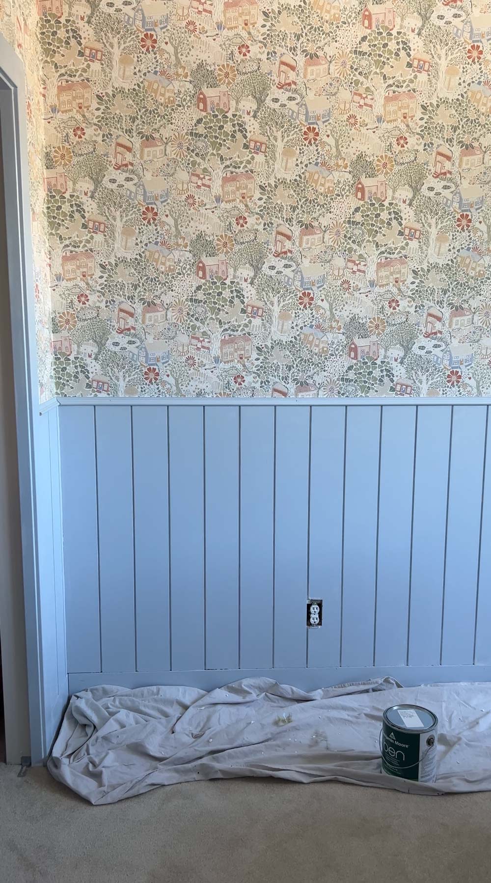 Floral wallpaper and blue board paneling. Floral wallpaper and blue board paneling.
