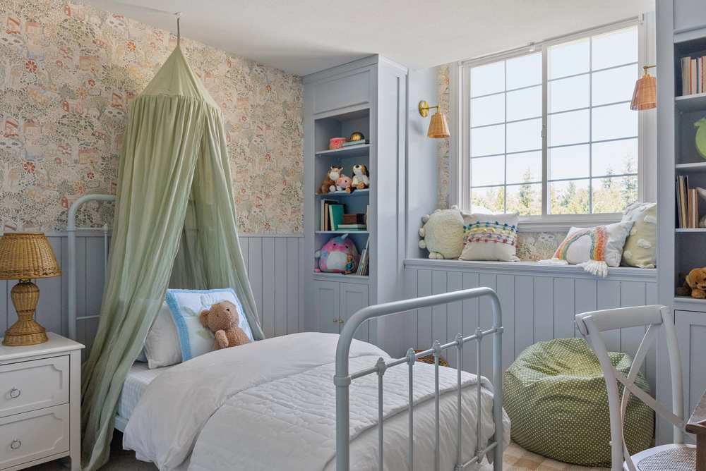 Left-side view of a completed kids room with a bright open window. Left-side view of a completed kids room with a bright open window.