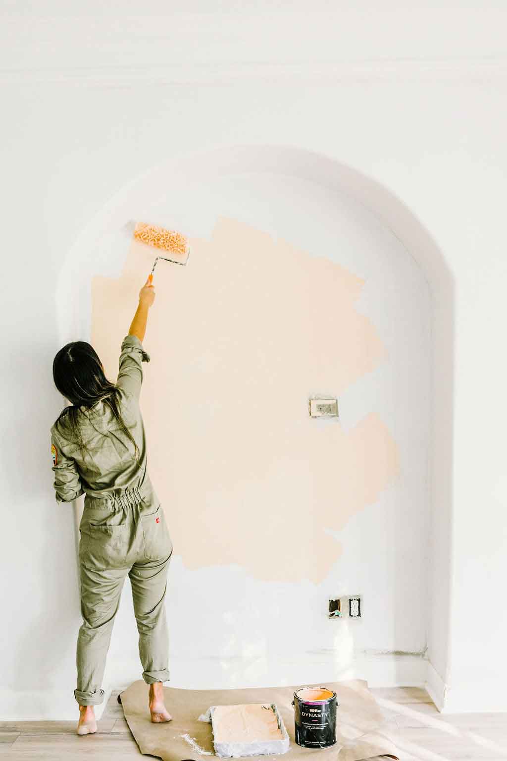 Woman painting arch Woman painting arch