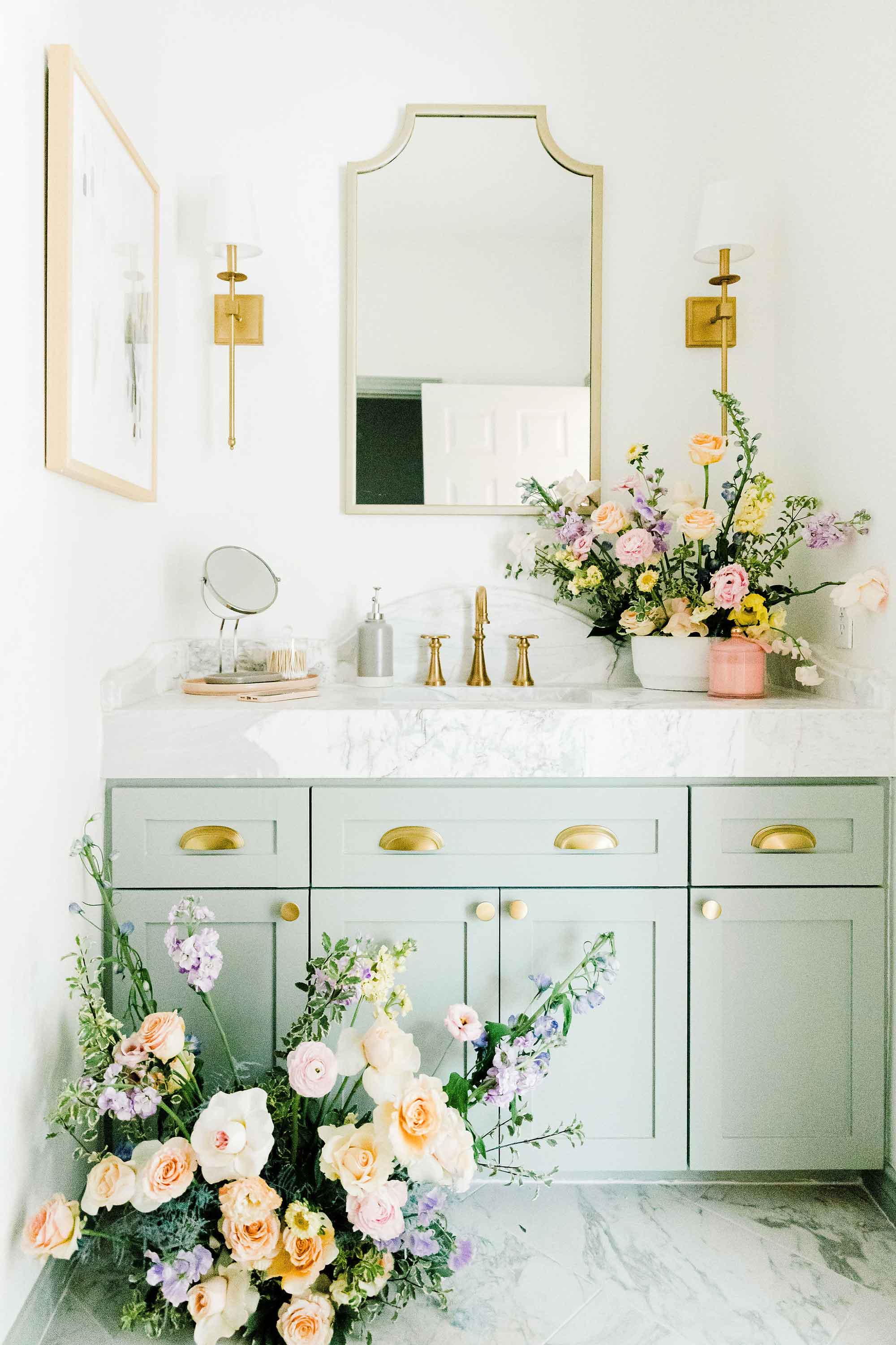 Bathroom cabinets with flowers around them Bathroom cabinets with flowers around them