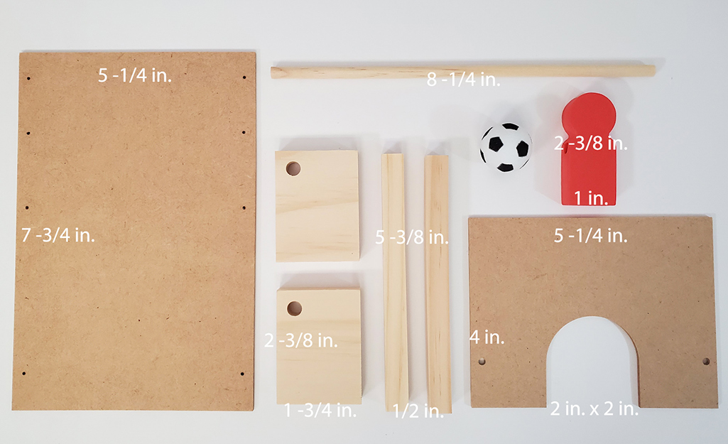 Soccer game pieces marked with measurements. Soccer game pieces marked with measurements.