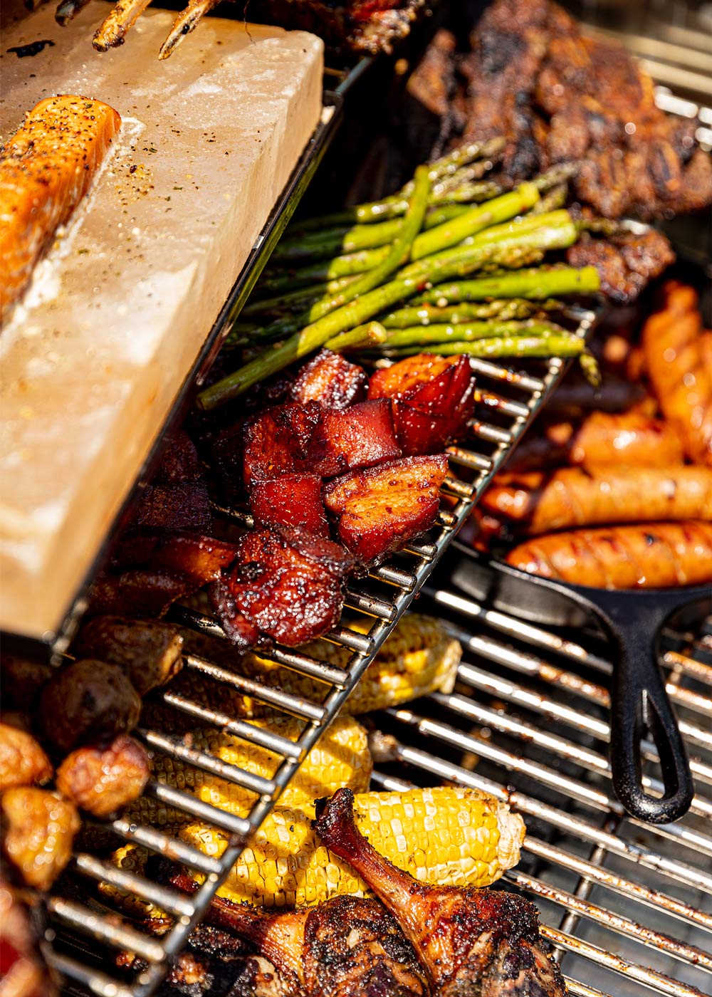Vegetables and meats cooking on a grill. Vegetables and meats cooking on a grill.