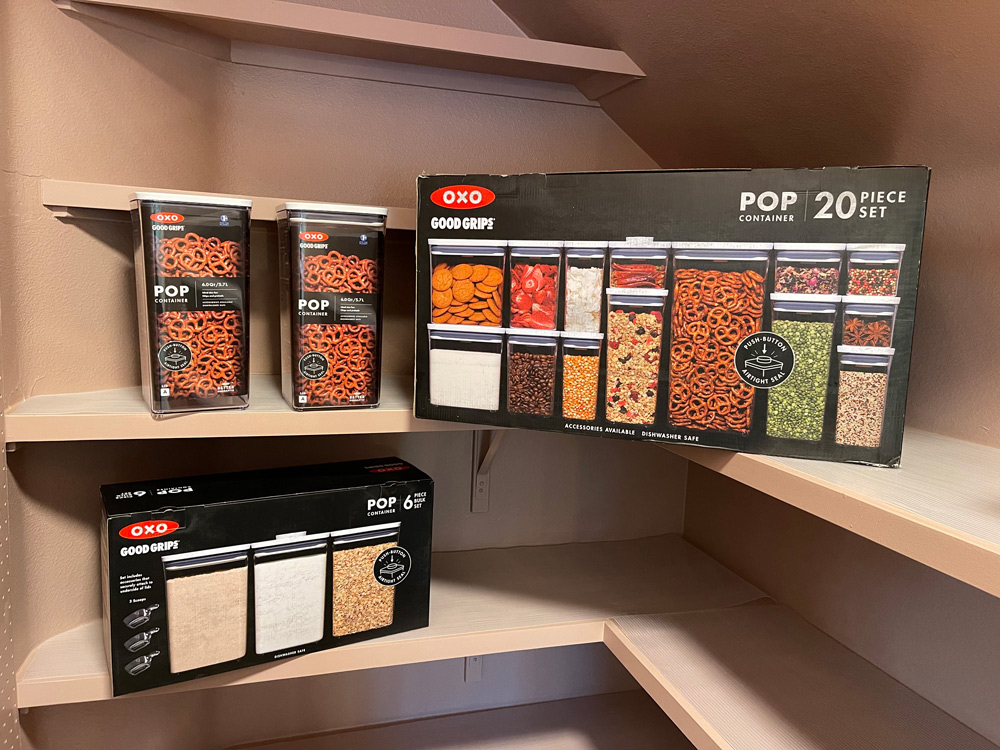 Three variety pack of food container boxes on shelves. 