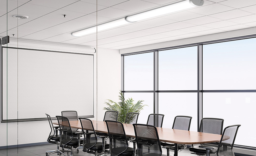LED ceiling light shines in a meeting room.