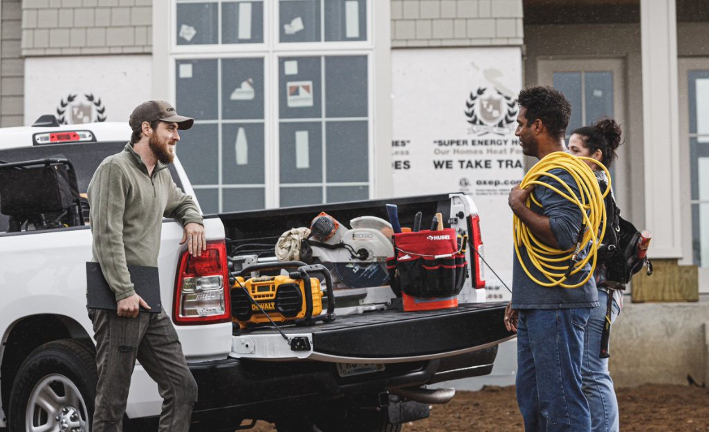 Pros prepare to delivery tools and materials to a building site. Pros prepare to delivery tools and materials to a building site.