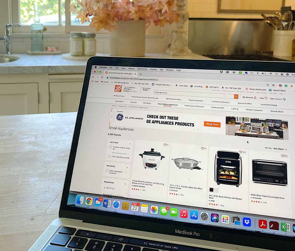 Photo for laptop with The Home Depot online on the screen.