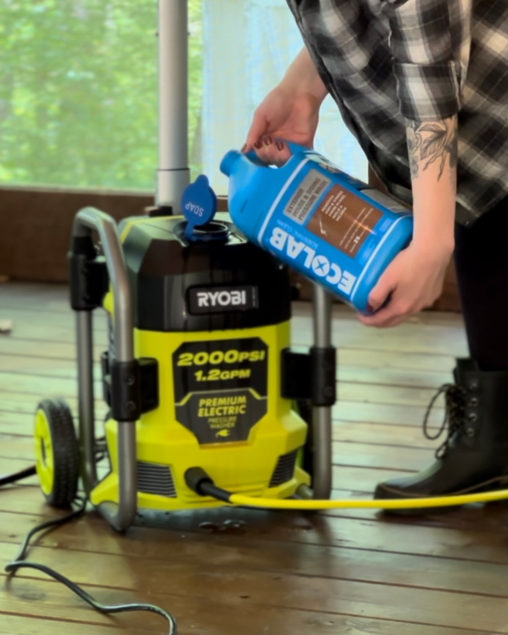 Person pouring Ecolab wash solution into a Ryobi pressure washer. Person pouring Ecolab wash solution into a Ryobi pressure washer.