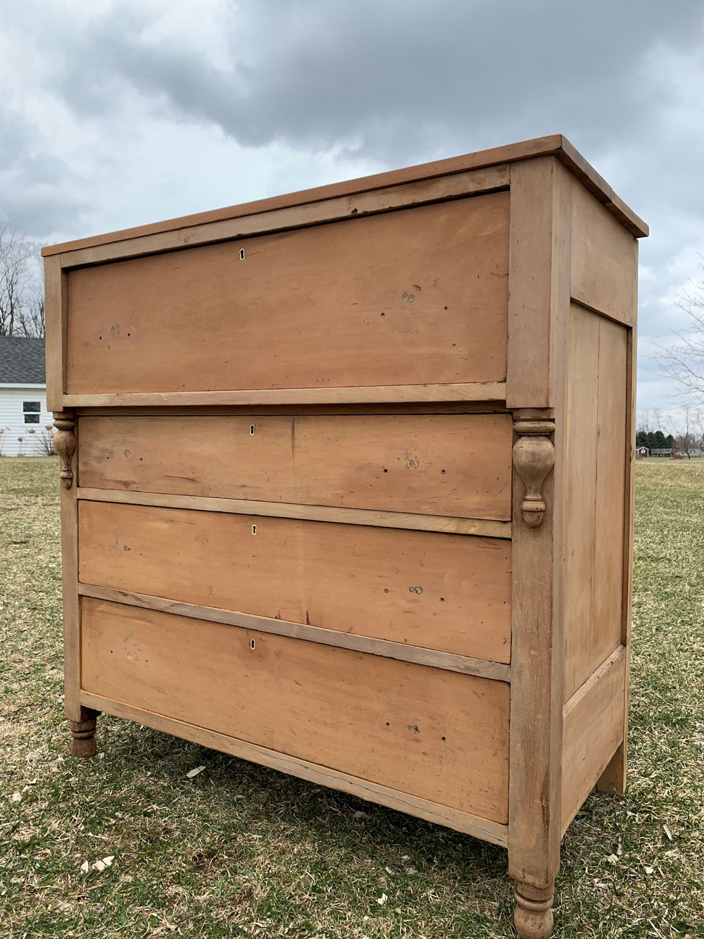  A stripped antique wooden dresser.