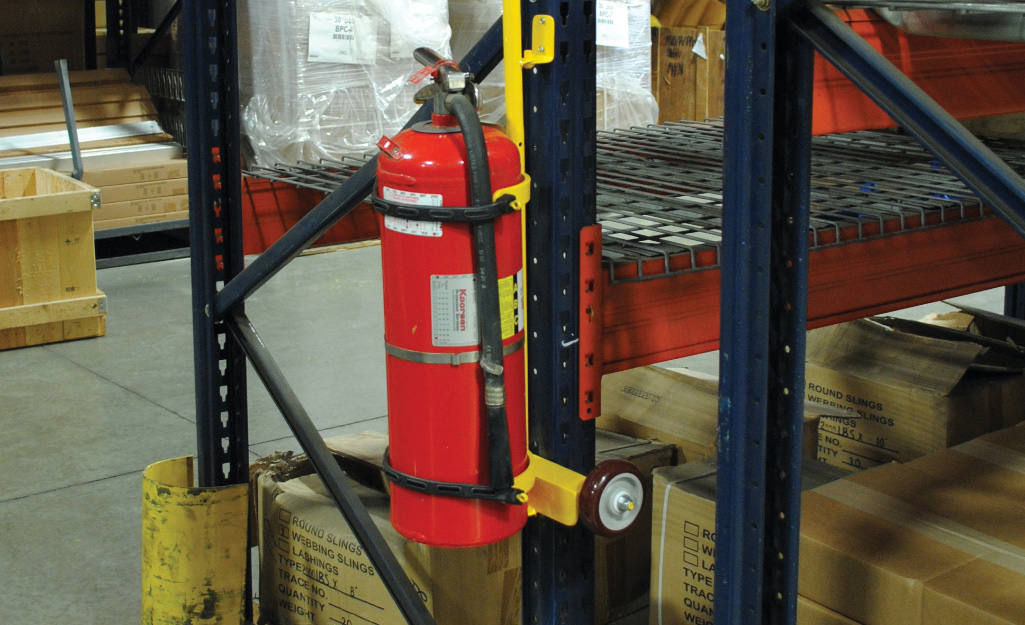 A fire extinguisher in a warehouse.